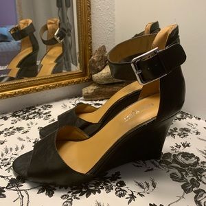 Nine West wedge heels with ankle strap.